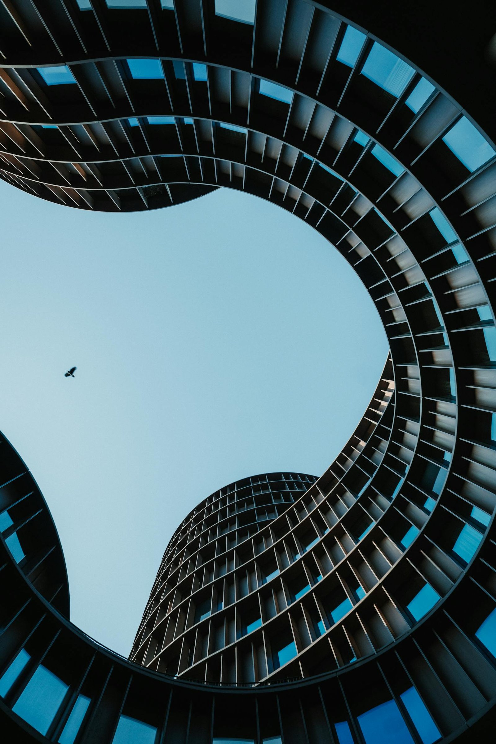 Stunning architectural view of wavy skyscrapers in Copenhagen, showcasing modern urban design.